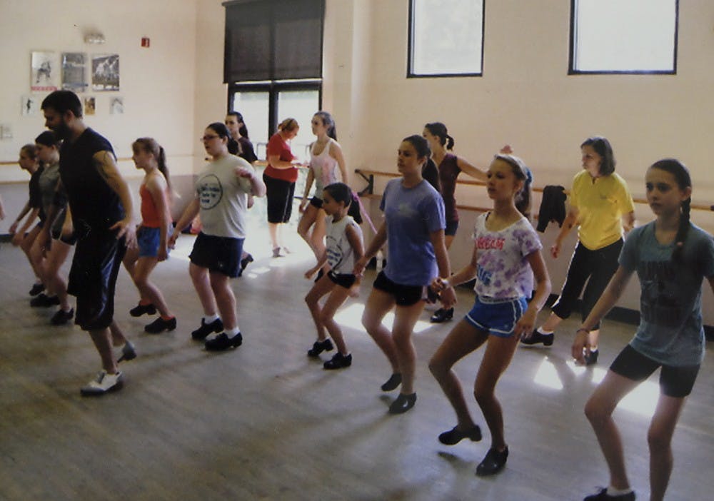 Nicholas Van Young, a 10-year veteran of the dance group STOMP, leads a class a the Ballet School of Chapel Hill in 2011.