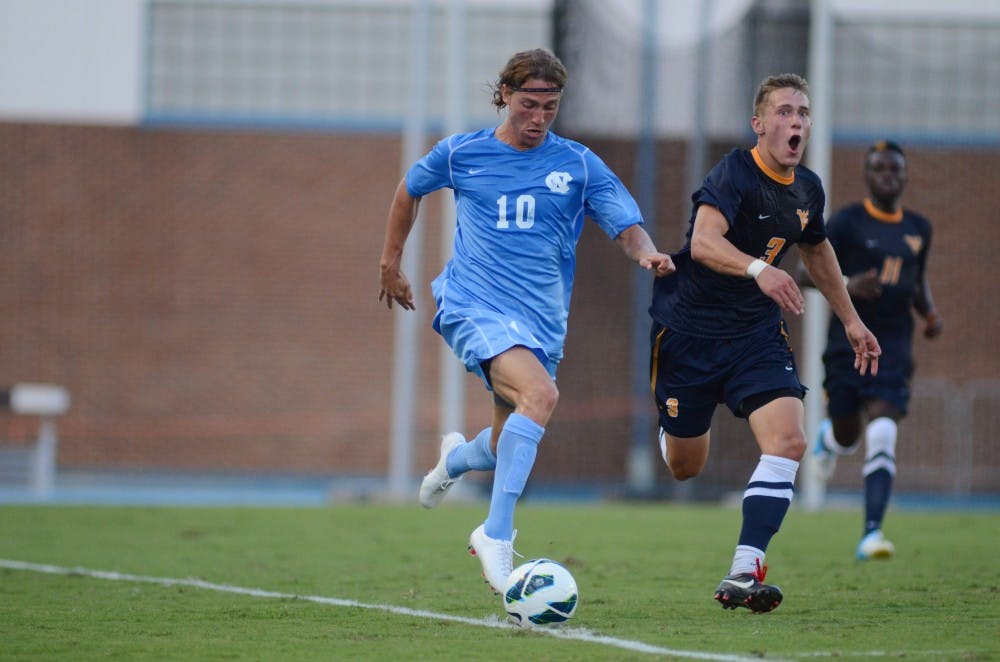 UNC Junior Andy Craven (10) keeps the ball in play in Carolina's 1-0 win over West Virginia on August 31, 2012 at Fetzer Field in Chapel Hill, North Carolina.