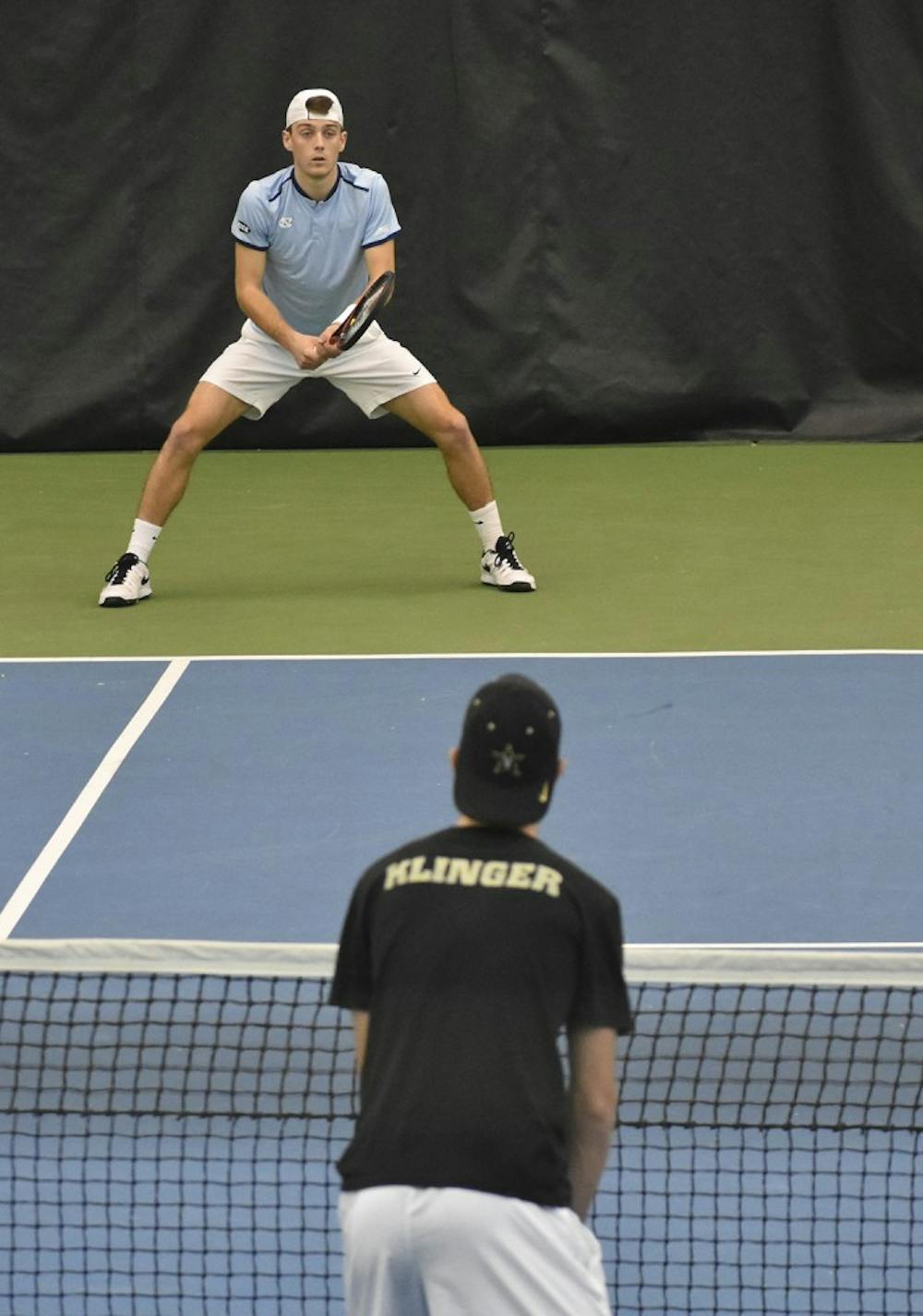 UNC men's tennis player Robert Kelly prepares to receive a serve against Vanderbilt.