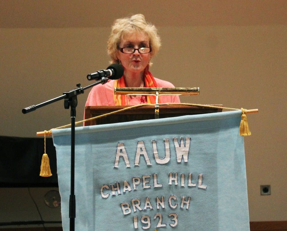 AAUW Chapel Hill's Annual Literacy Tea hosted author Lee Smith.  Smith speaks with women who attended the event before her speech about her journey from a young girl as a writer to her present day works.