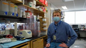 Dr. Mark Heise poses for a portrait in his lab inside the Burnett-Womack building on Monday, Feb. 8, 2021. Heise is a a professor of microbiology, immunology and genetics in the UNC School of Medicine and a collaborator of READDI.