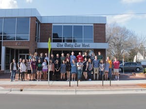 A portion of the 2016-17 staff of The Daily Tar Heel poses outside of their office.