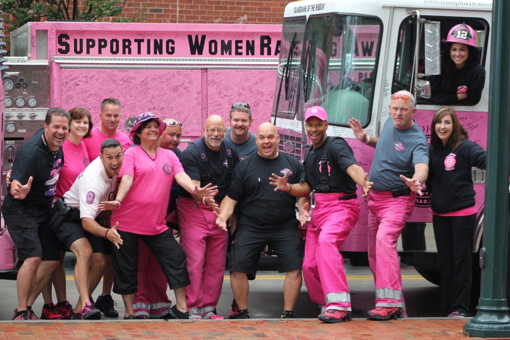 Founder Dave Graybill (pictured far left) unifies firefighters, police officers, and civilian volunteers from across the nation in support of Pink Heals. Graybill pointed out that he's "created a program that stimulates the communities to start fundraising with the program and giving it back to the people in the community that are battling all things, starting with cancer. The motivator is the woman."