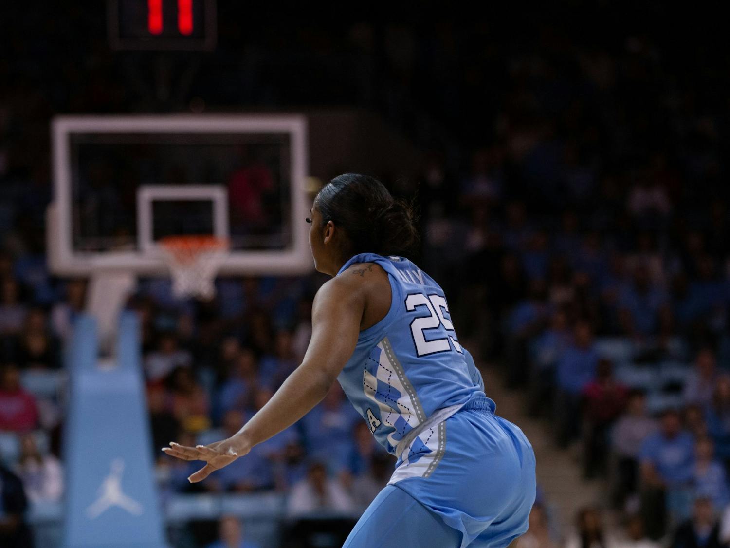 UNC junior guard Deja Kelly (25) defending during the women's basketball game against the NC State Wolfpack in Carmichael Arena on Sunday, Jan. 15, 2023. The Tar Heels won 56-47.