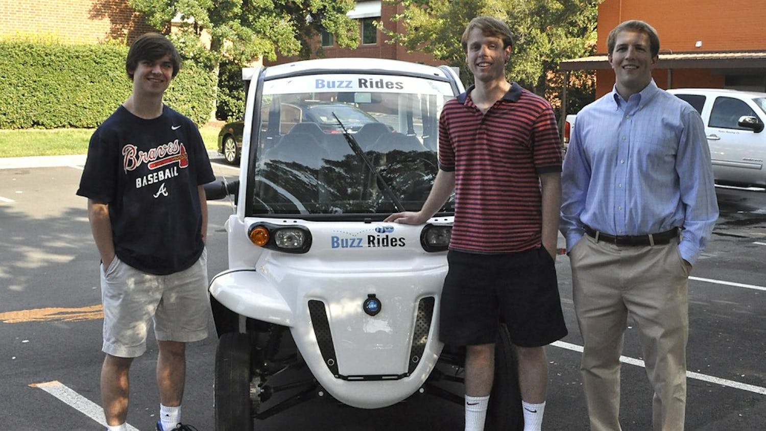 From left to right, co-founders of Buzz Rides Parker Draughon (President), a Business Administration and Romance Languages major from Atlanta, Ga., and Joey Skavroneck (CEO), a Business Administration major from Waxhaw, N.C., stand with Chris Jones (CFO), a Business Administration major from Charlotte, N.C. 