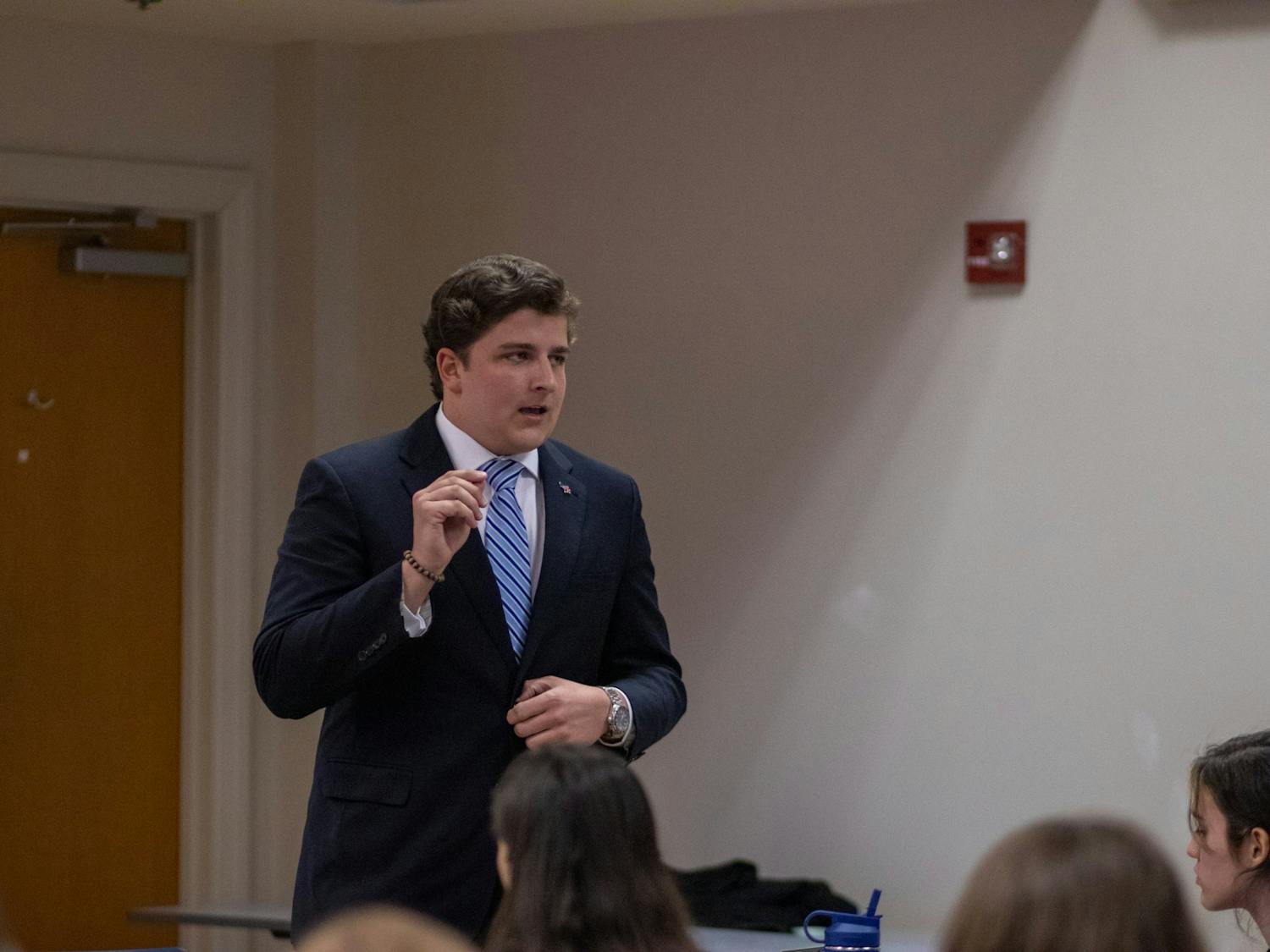 Student Body President candidate Sam Robinson speaks to the crowd of students at UNC-CH's Young Democrat's SBP Town Hall on Feb. 7. 2023.