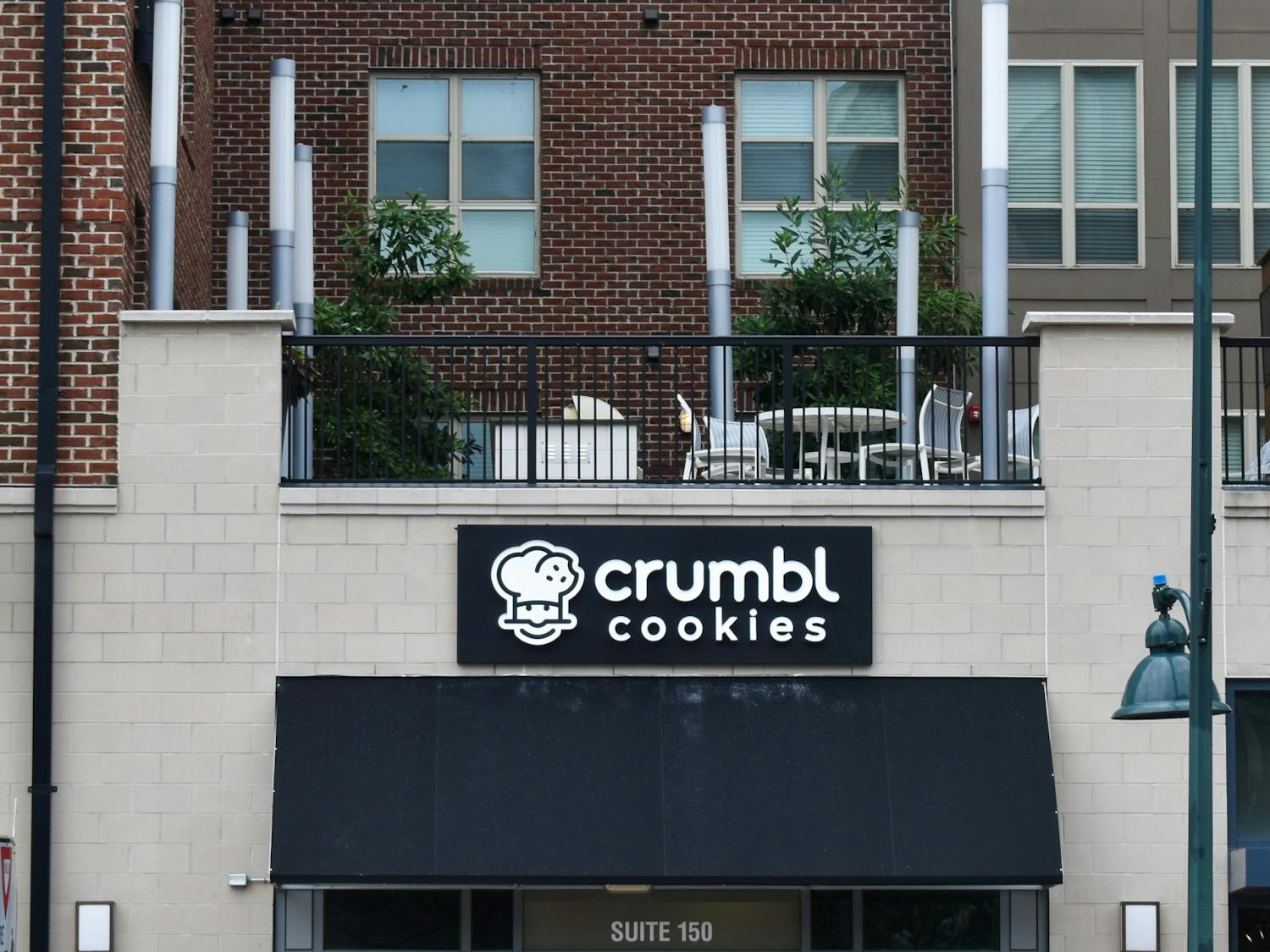 The new Crumbl Cookies sign located on Franklin Street on Wed. July 13, 2022.