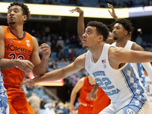 UNC junior forward Justin McKoy (22) plays defense during UNC Men's basketball's home game against Virginia Tech on Monday, Jan. 24, 2022, at the Dean Smith Center.