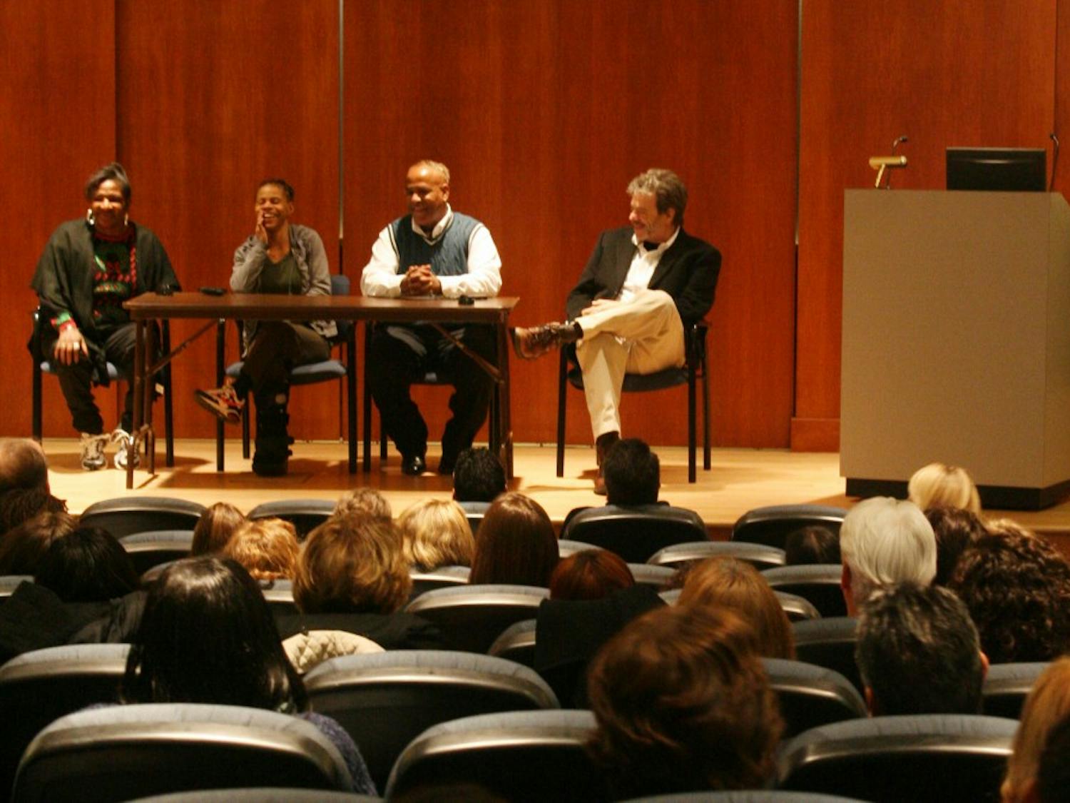 Four HIV positive people participate in an open discussion as a part of the 12th Anuual HIV/AIDS Symposium on Wednesday. 