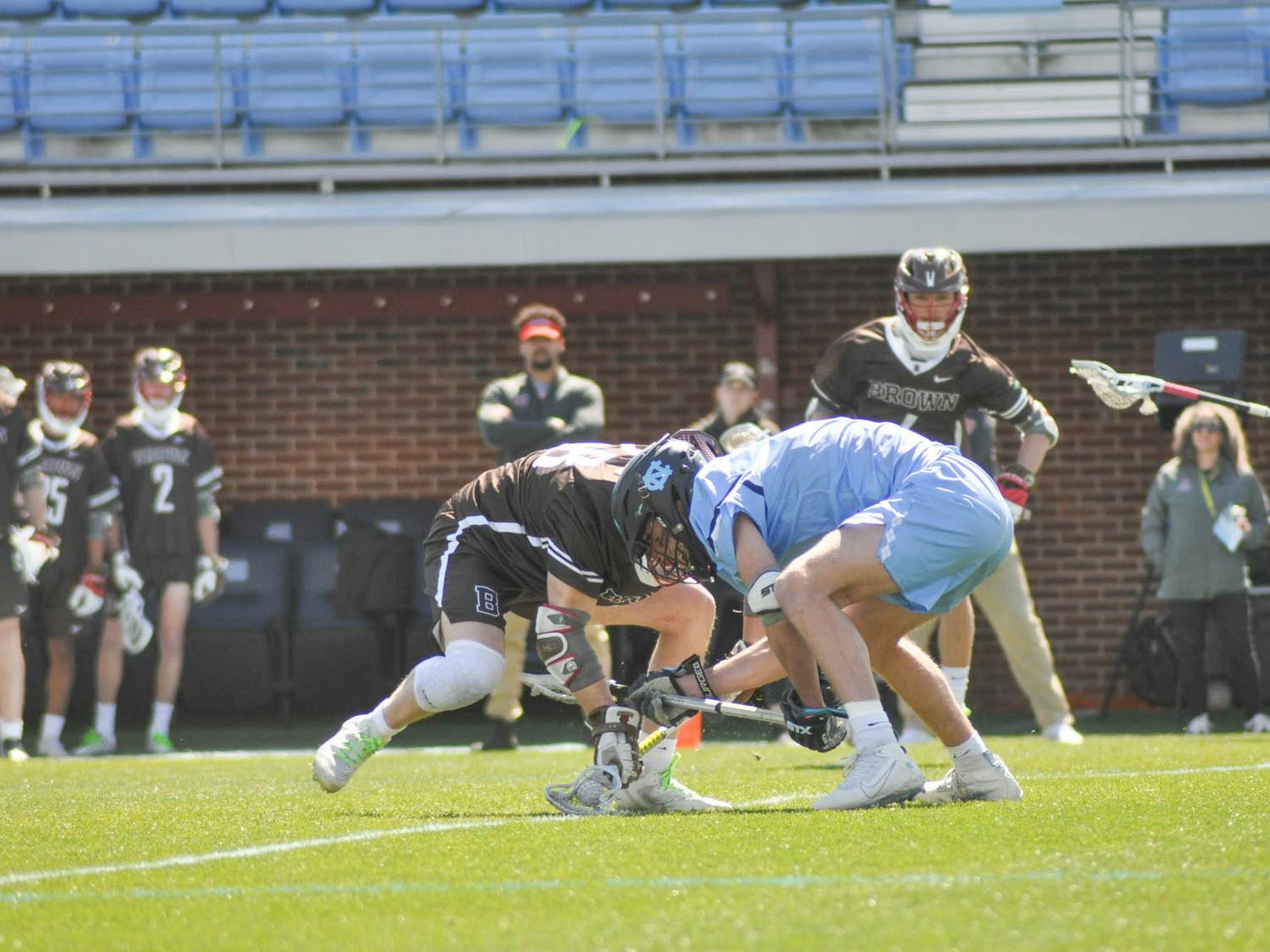 Senior face-off midfielder Andrew Tyeryar (3) takes the face-off during the men's lacrosse game against Brown at Dorrance Field on Saturday, March 11, 2023. UNC won 19-6.