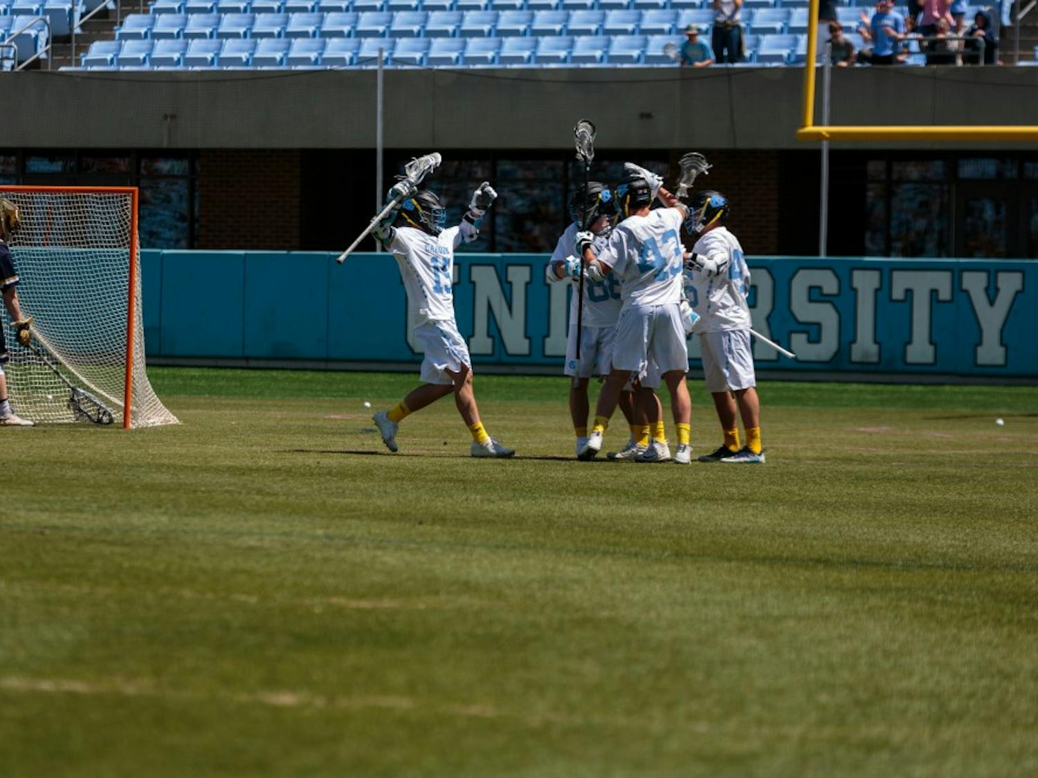 The North Carolina men's lacrosse team celebrates a goal against Notre Dame on April 21 at Kenan Stadium.