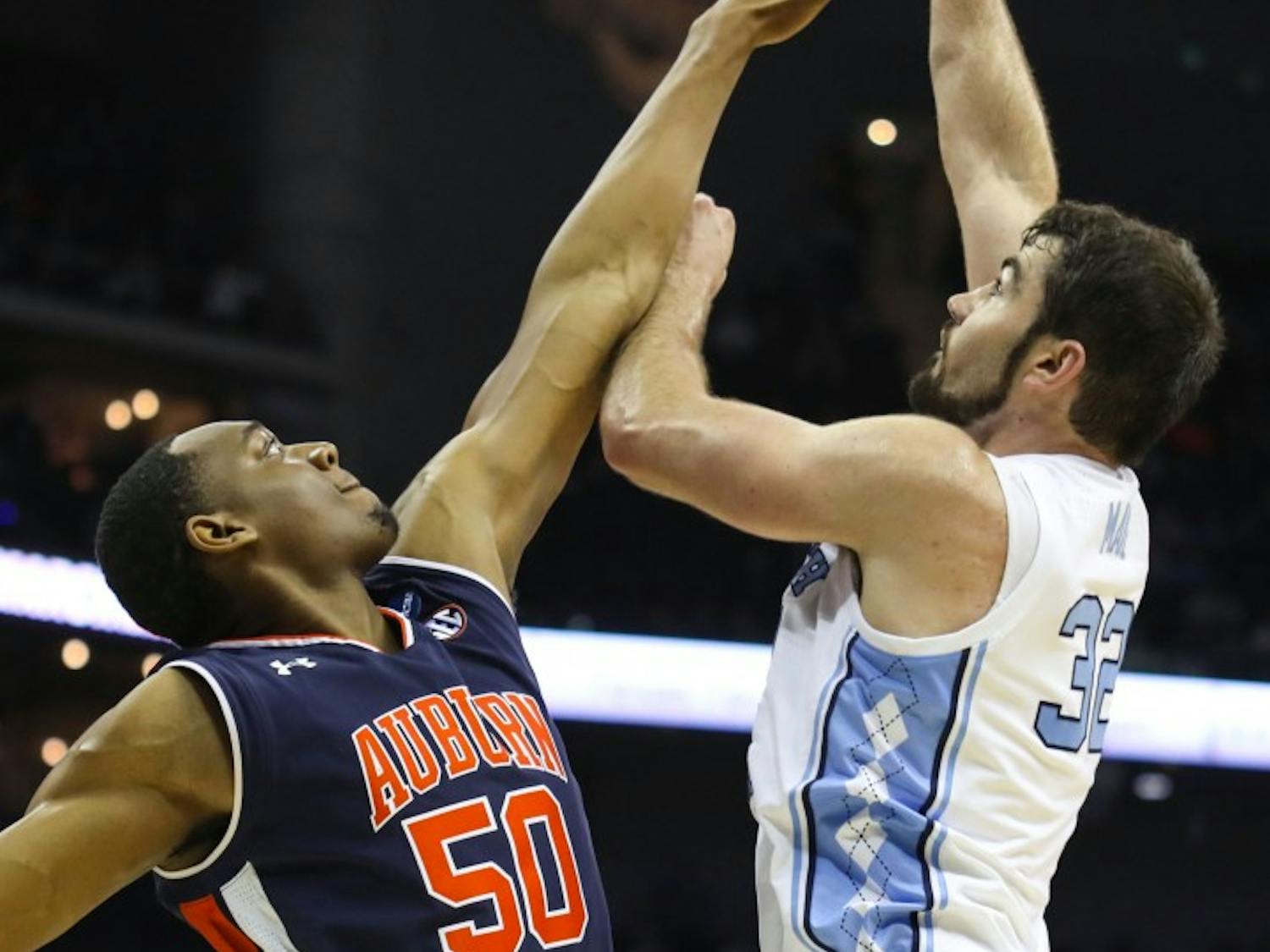 Auburn junior center Austin Wiley (50) guards UNC senior forward Luke Maye (32) during UNC's 97-80 loss against Auburn in the Sweet 16 of the NCAA Tournament on Friday, March 29, 2019 at the Sprint Center in Kansas City, M.O.