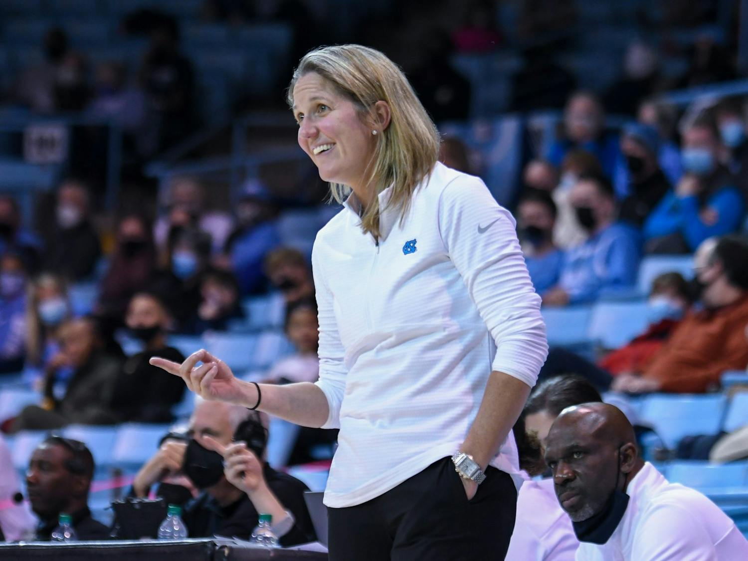 Head coach Courtney Banghart points and smiles at one of the players during the game against Alabama State in Carmichael Arena, on Dec 21, 2021.