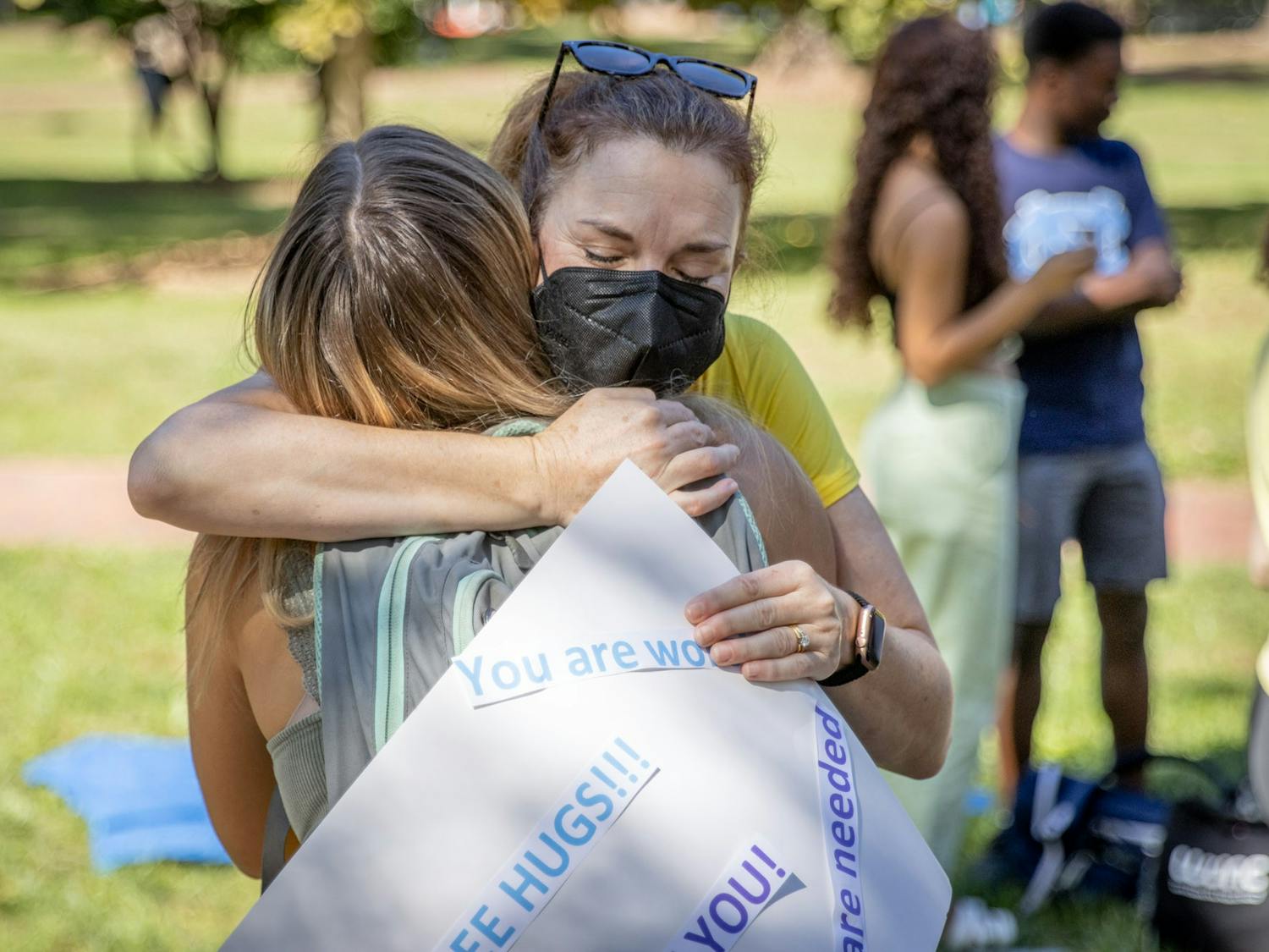 The Chapel Hill community came together in many ways this week to support mental health on campus, including dogs from Eyes Ears Nose and Paws and a parent rally organized by a Facebook group.