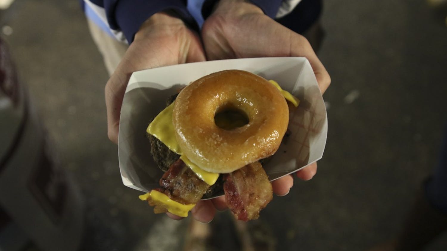 Krispy Kreme burgers are one of many unique foods one can find at the N.C. State Fair.