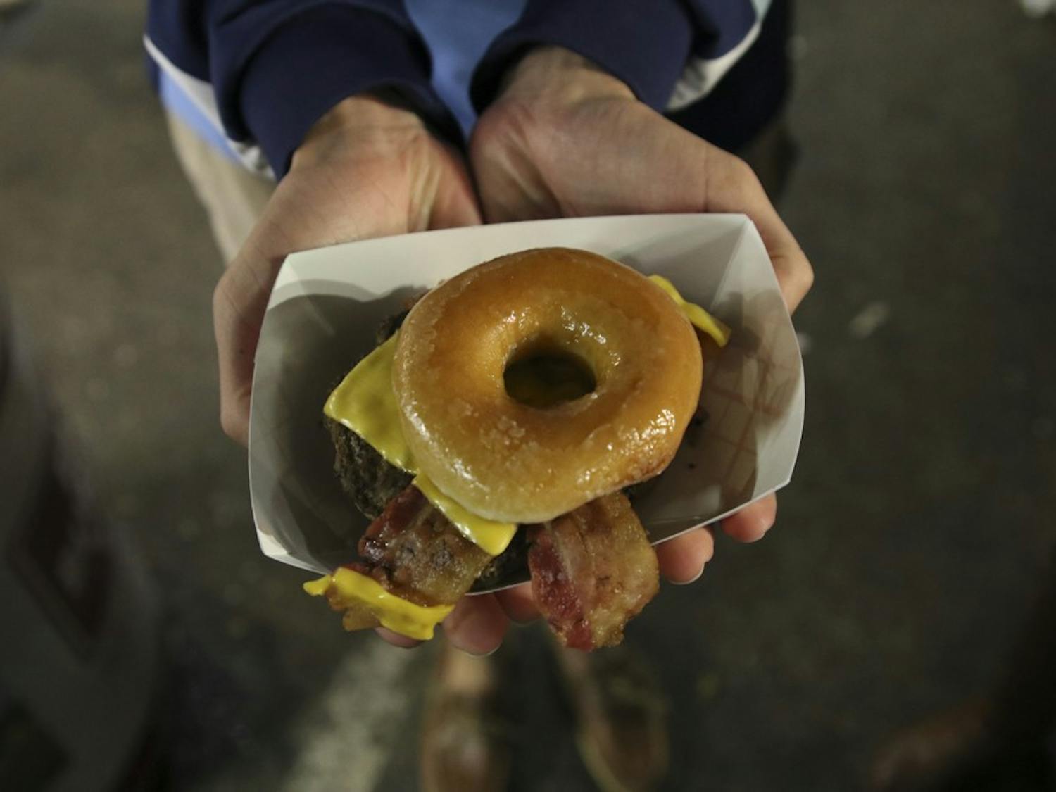 Krispy Kreme burgers are one of many unique foods one can find at the N.C. State Fair.