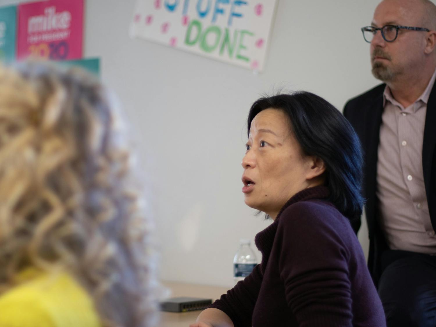 Chapel Hill council member Hongbin Gu asks a question of Tim O'Brien (not pictured) during a Bloomberg 2020 "strategy session" at the campaign's Chapel Hill office on Tuesday, Jan. 21, 2020.