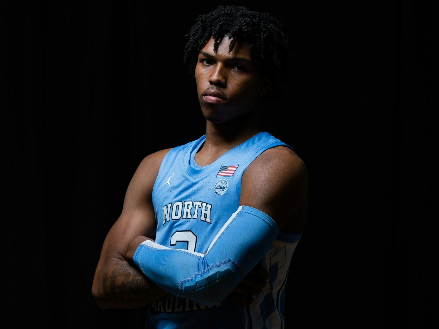 UNC first year guard Caleb Love poses for a portrait in the Smith Center on Wednesday, October 7, 2020. Photo courtesy of Morgan Pirozzi for UNC Athletic Communications. 