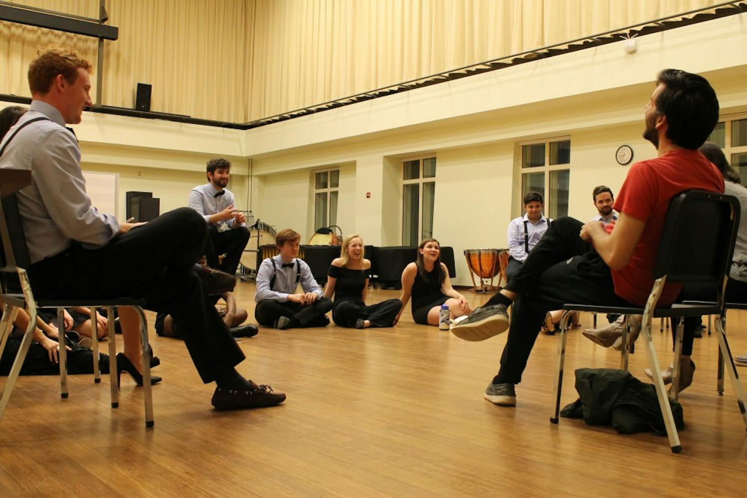 Members of Tar Heel Voices prepare for their upcoming competition at a rehearsal.