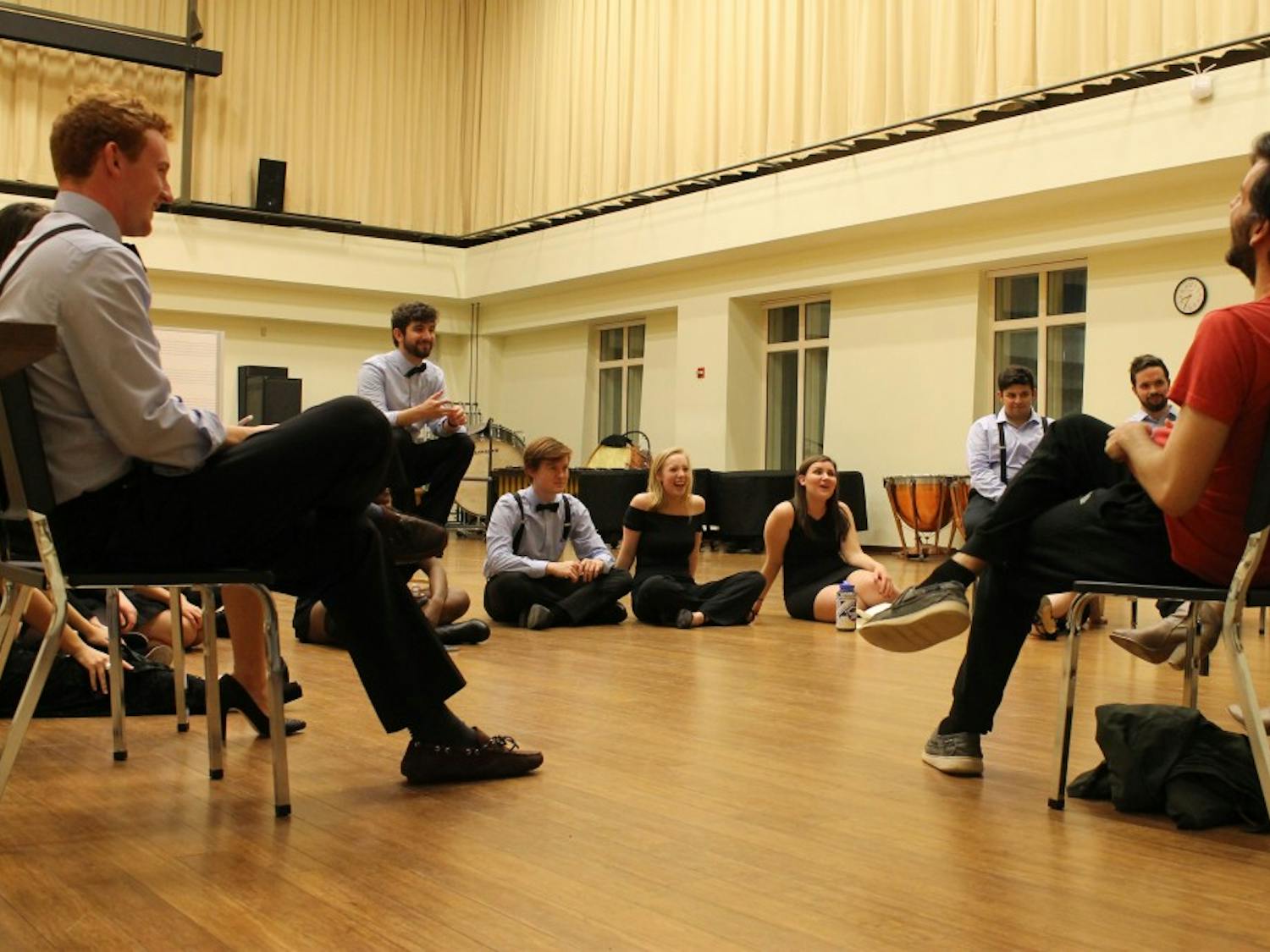Members of Tar Heel Voices prepare for their upcoming competition at a rehearsal.