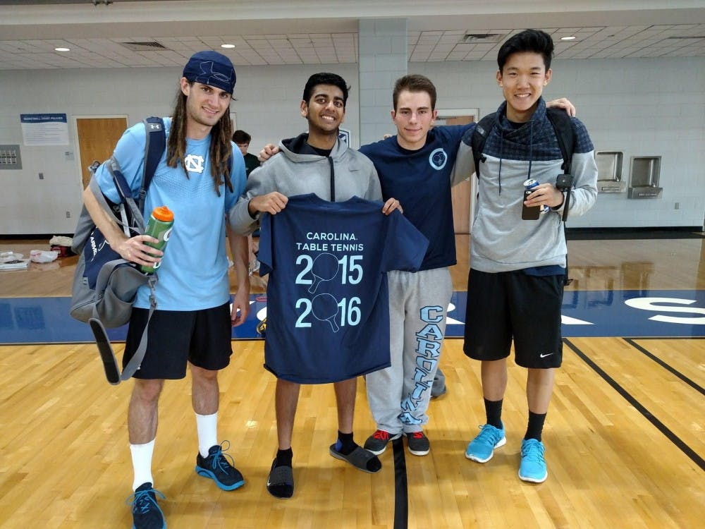 <p>From left,&nbsp;Luke brown,&nbsp;Steven DeePee, Alex Gartland and Andrew Chang pose with a 2015 table tennis t-shirt.&nbsp;Photo courtesy of Alexander Gartland.&nbsp;</p>