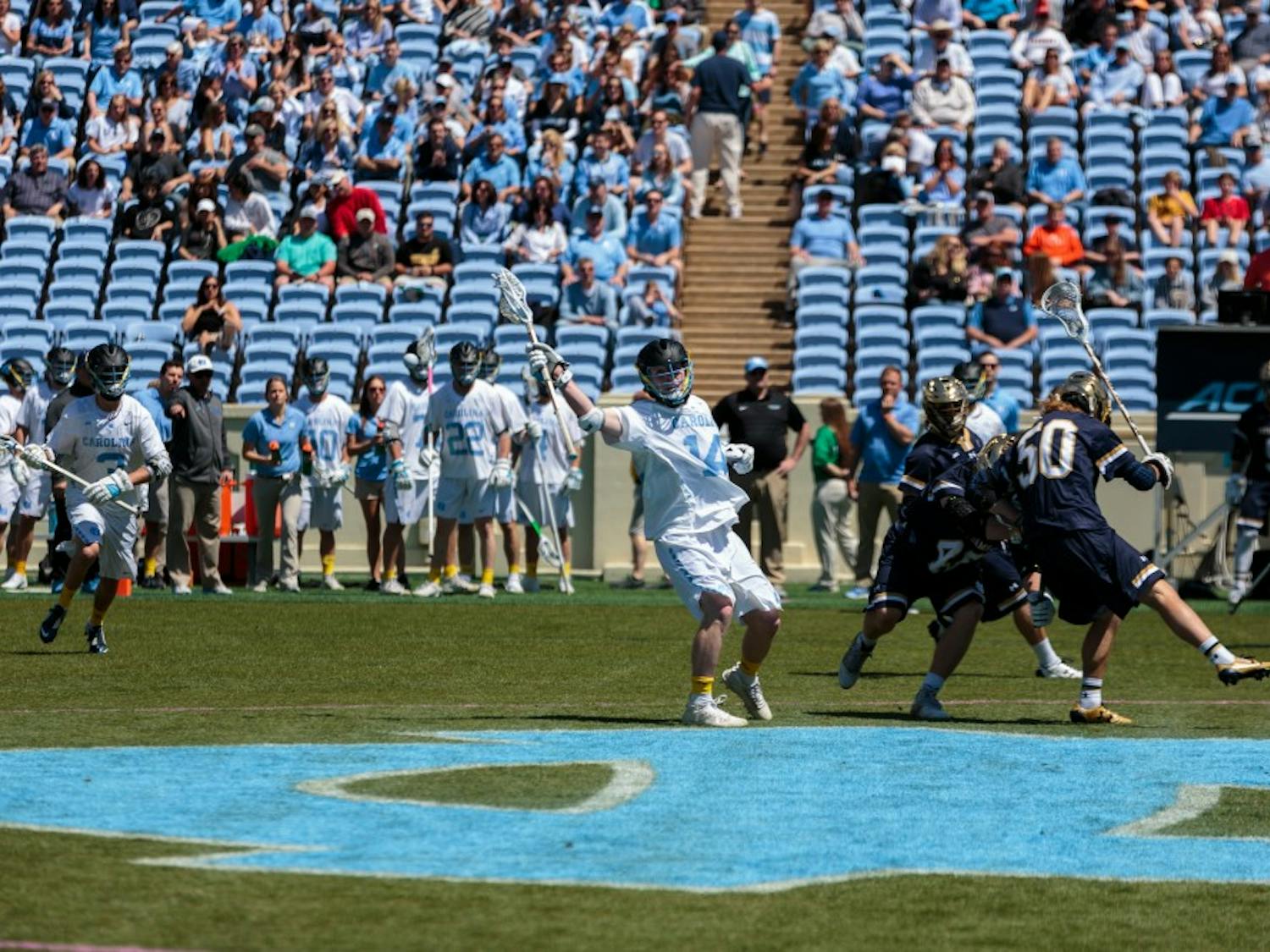 UNC's William McBride (14) calls for the ball against Notre Dame on April 20 at Kenan Stadium.