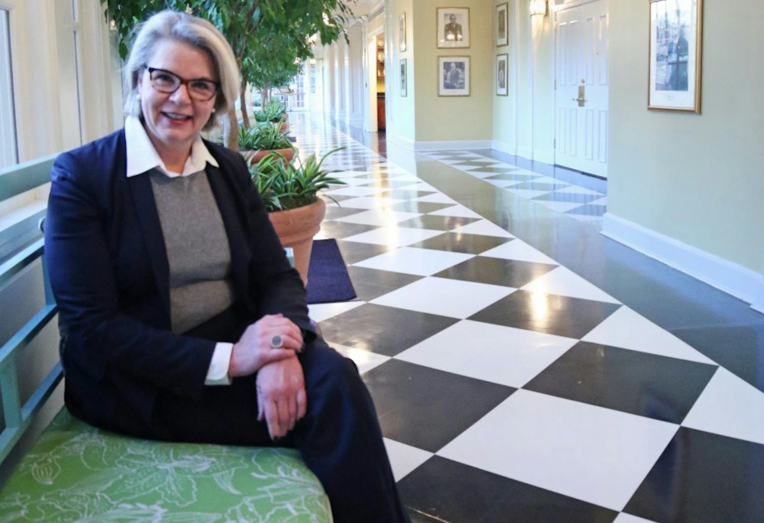 New UNC-System president Margaret Spellings sits in the historic Carolina Inn.