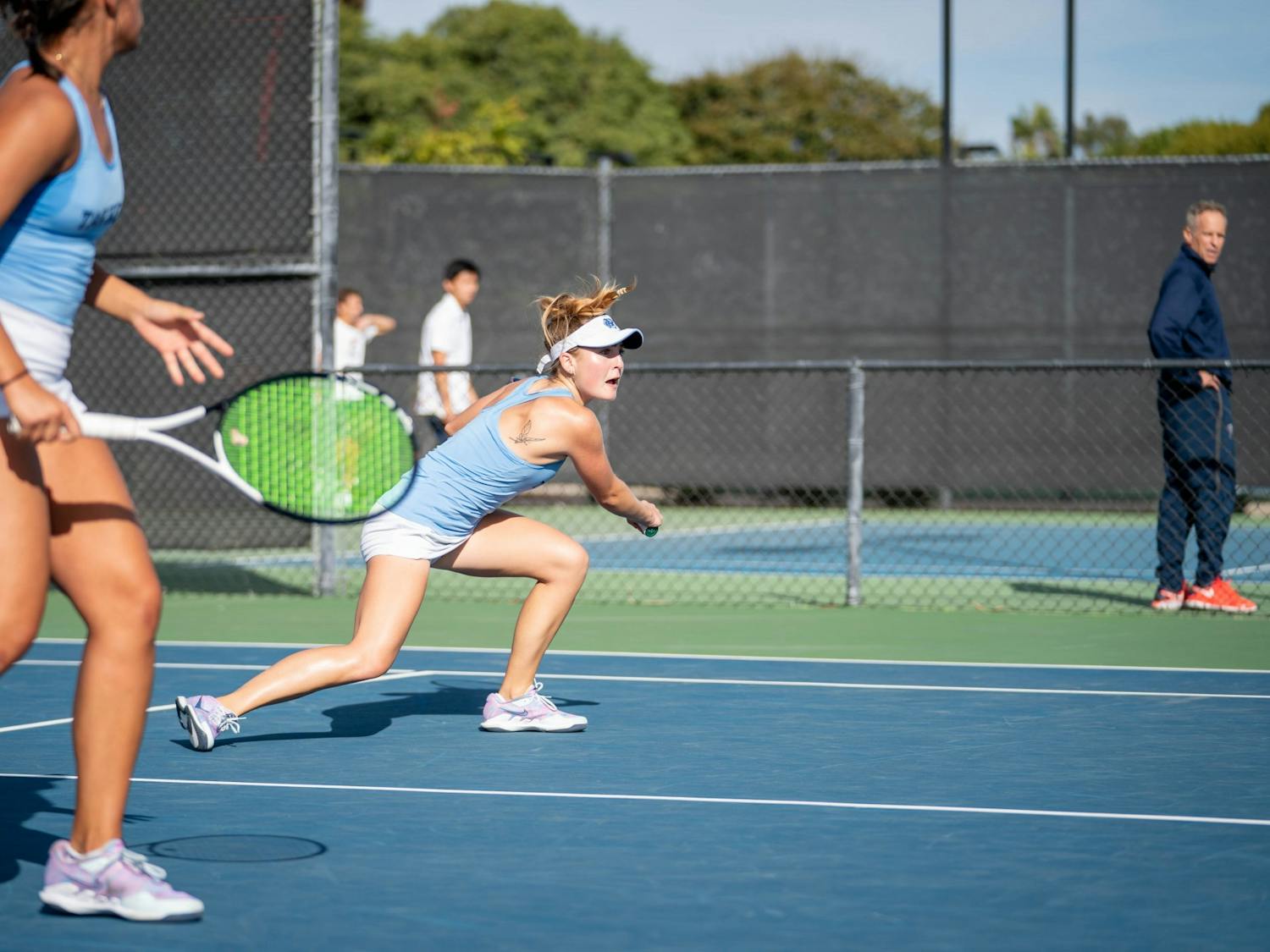 UNC Sophomore Carson Tanguling and UNC Junior Fiona Crawley play doubles at the ITA National Championship. Photo Courtesy of ITA. 