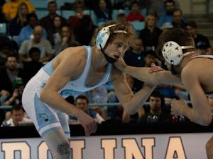 UNC redshirt sophomore Zach Sherman wrestles against his opponent in the match against Arizona State in the Carmichael Arena on Sunday, Feb. 23, 2020. Zach won this bout but UNC lost 9-22 overall.
