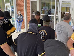 The Proud Boys gather outside of an Orange County Schools Board of Education meeting on Oct. 11, 2021. 
Photo Courtesy of Allison Mahaley.&nbsp;