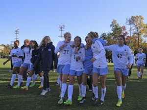 The North Carolina women's soccer team walks off the field in joy after defeating Clemson, 1-0, in the third round of the 2016 NCAA Tournament.