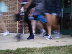 Students leave East Chapel Hill High School on Monday, Sept. 12, 2022.