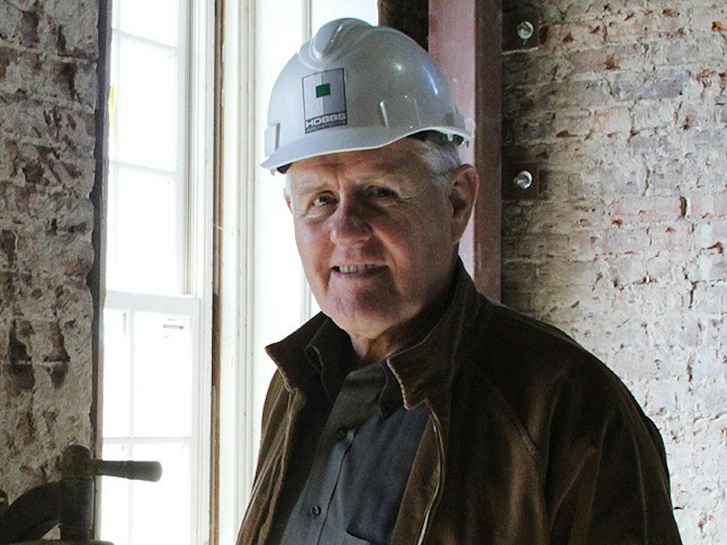 Grimsley Hobbs, Jr. of Hobbs Architecture stands proudly in the  Chatham County Courthouse that his company is currently rebuilding after it burned in a catastrophic fire in March 2010. The courthouse is expected to be finished in December. 