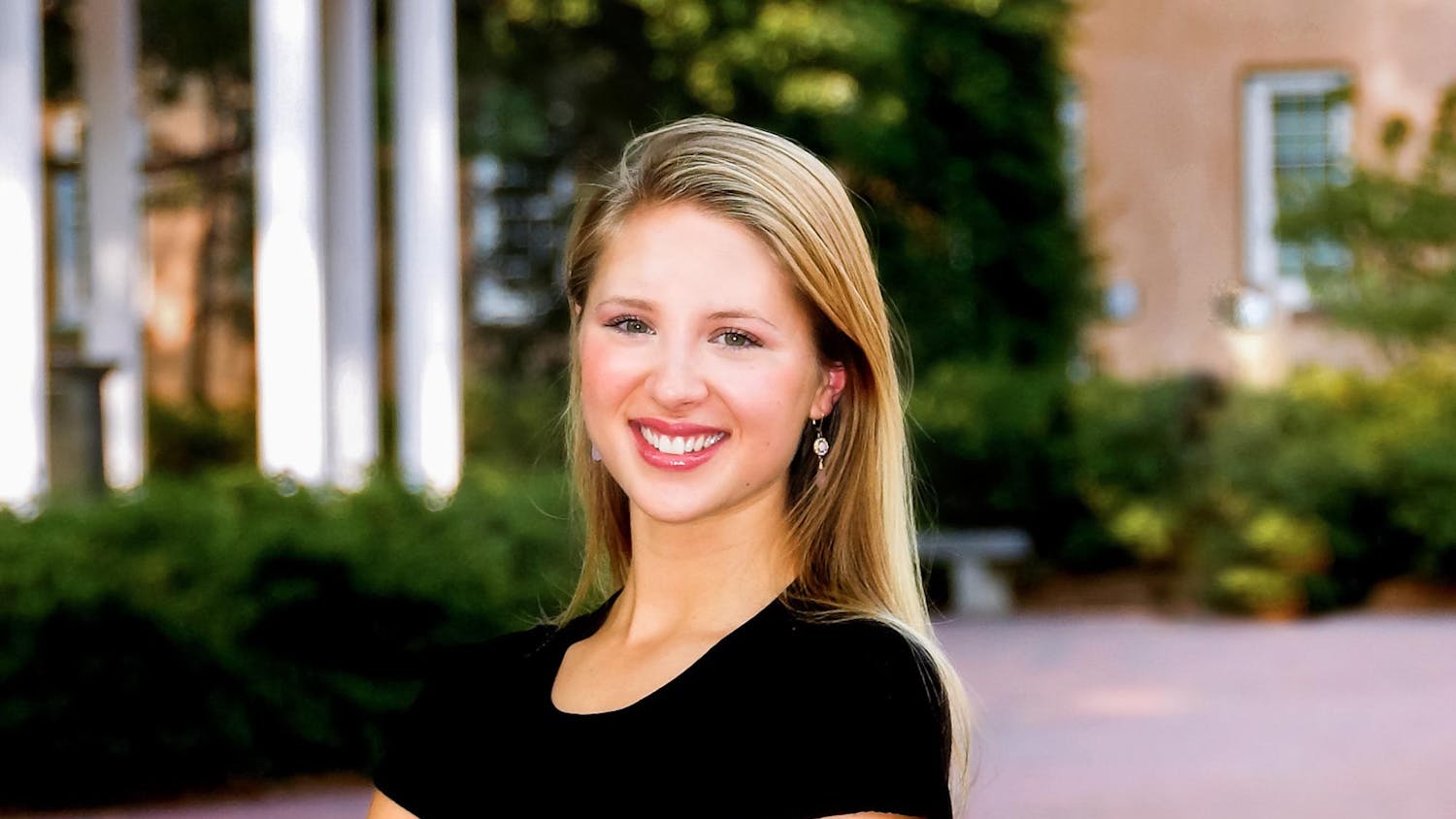 Eve Carson poses for a portrait in front of the Old Well on Oct. 8, 2007. The Eve Carson Scholarship, established in honor of 2008 UNC Student Body President Eve Carson, awards students for their leadership and service on campus. 

Photo Courtesy of The Eve Carson Scholarship Executive Committee/Mary Moore McLean.