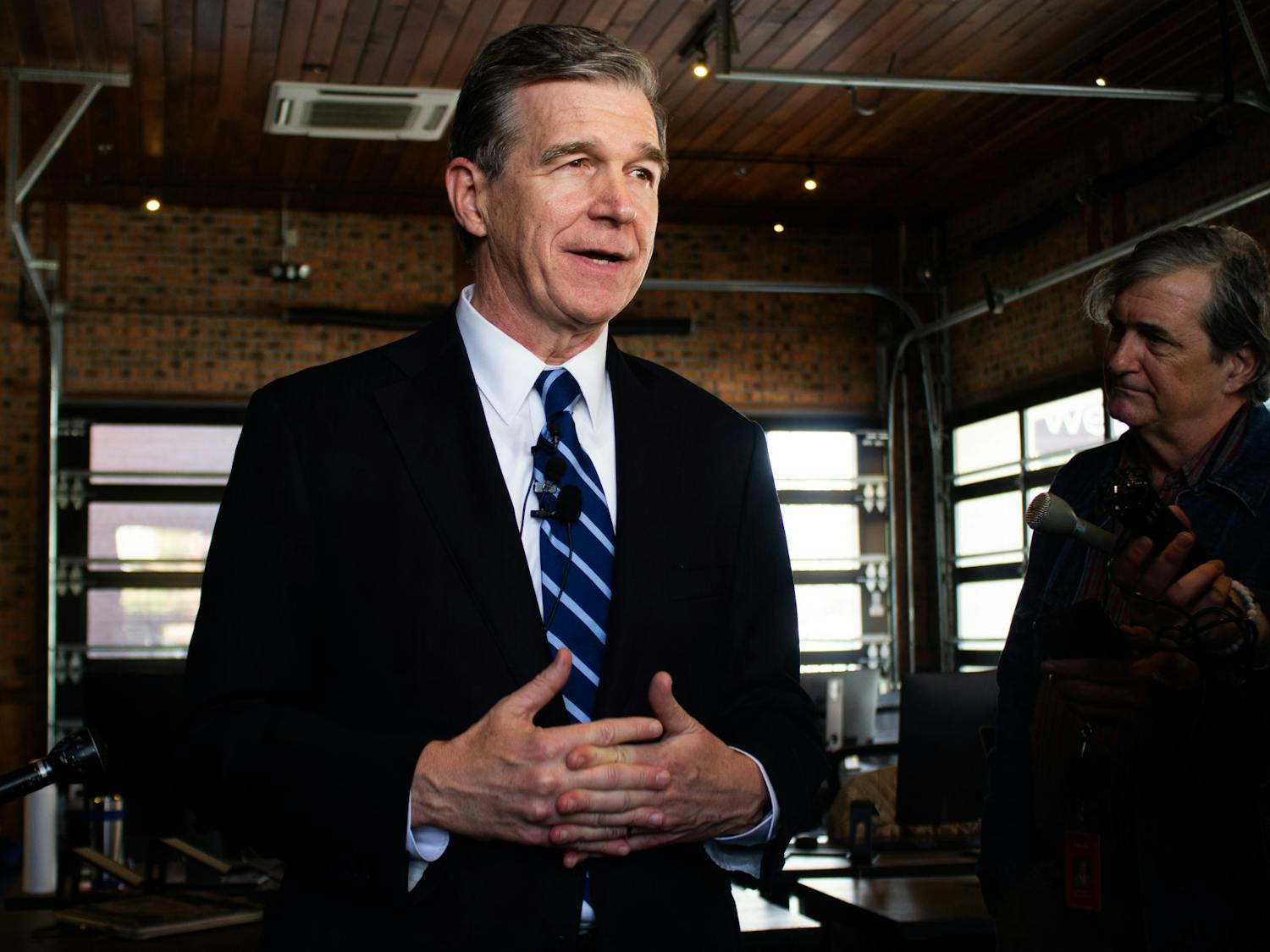 Governor Roy Cooper announced a new economic development plan at Well on W. Franklin Street on Tuesday, Nov. 19, 2019. 