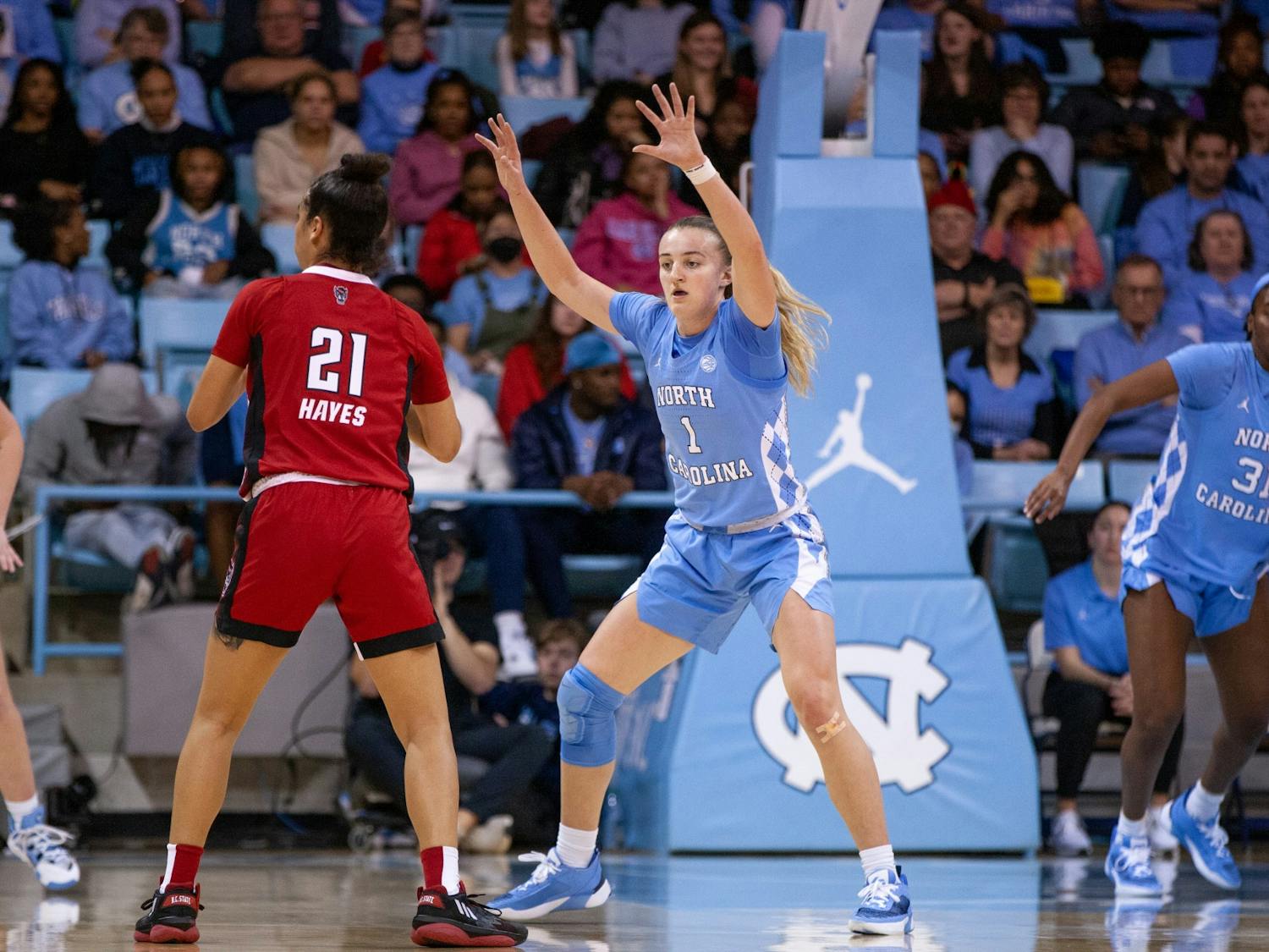 UNC junior guard/forward Alyssa Ustby (1)  defending during the women's basketball game against the NC State Wolfpack in Carmichael Arena on Sunday, Jan. 15, 2023. The Tar Heels won 56-47.