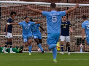 The UNC men's soccer team celebrates after a scored goal at the game against Notre Dame on Friday, Oct. 29th at Dorrance Field. UNC won 3-1.