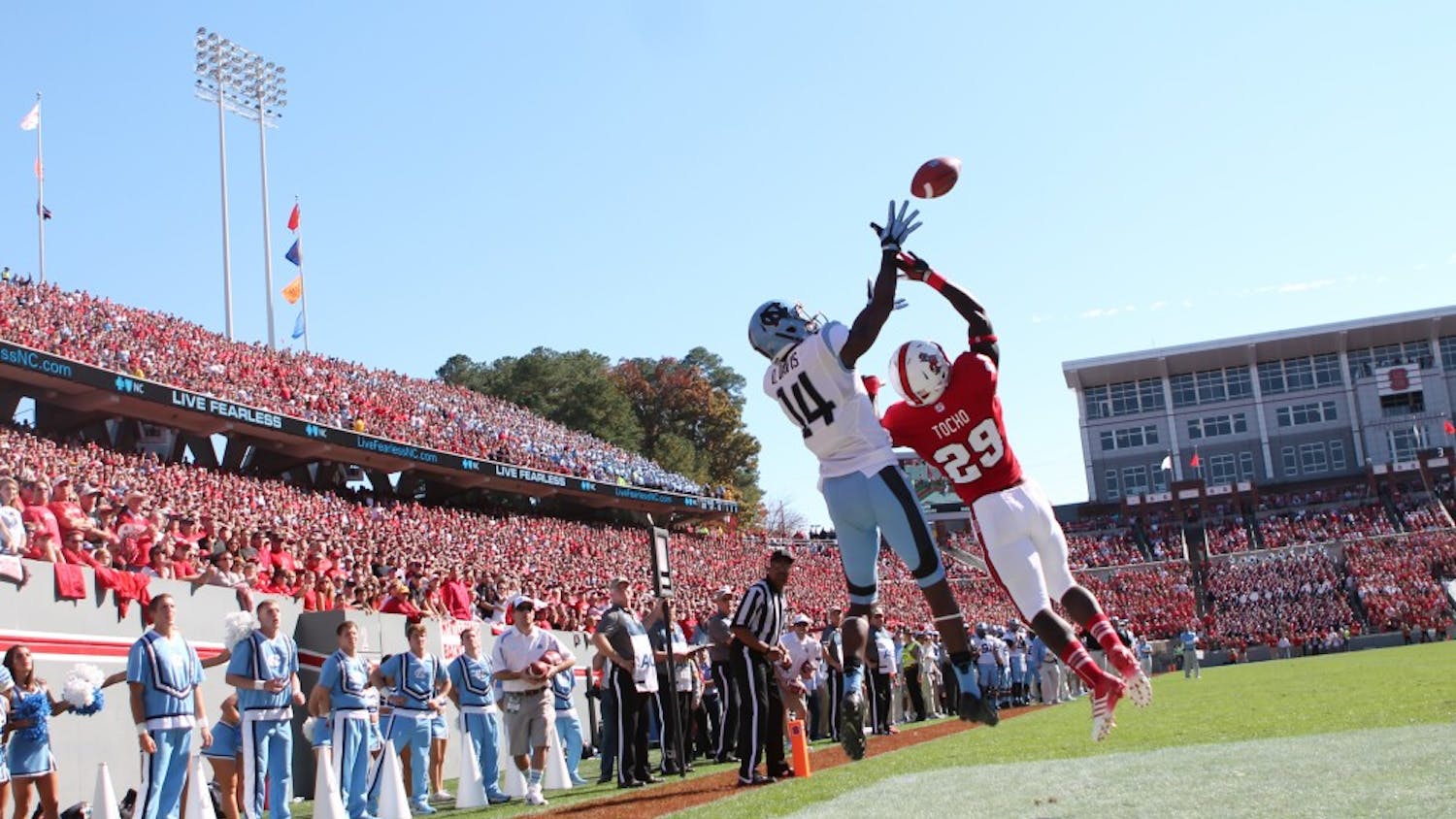 	Wide Receiver Quinshad Davis (14) catches UNC&#8217;s first touchdown of the game against N.C. State.