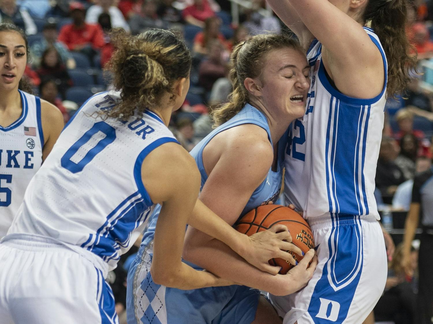 UNC junior guard Alyssa Ustby (1) tries to maintain possession of the ball during the women’s basketball game in the third round of the ACC tournament in Greensboro, N.C., on Friday, March 3, 2023. UNC fell to Duke 40-44.