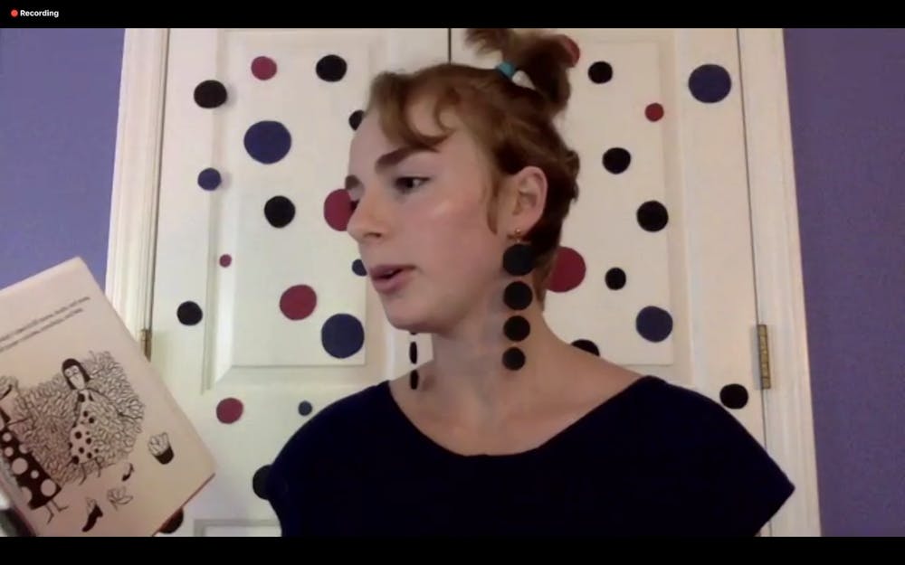 <p>Carrie Young, Ackland Art Museum's public programs intern, reads aloud during a live Zoom "Storytime" that was inspired by the Ackland’s current exhibition, "Yayoi Kusama: Open the Shape Called Love" on Sunday, May 31, 2020.</p>