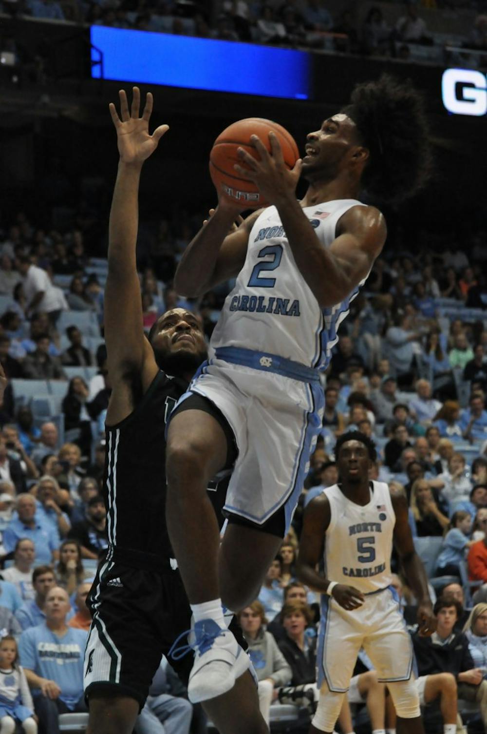 <p>UNC first-year guard Coby White (2) takes a shot during exhibition game against Mount Olive on Friday Nov. 3.&nbsp;</p>