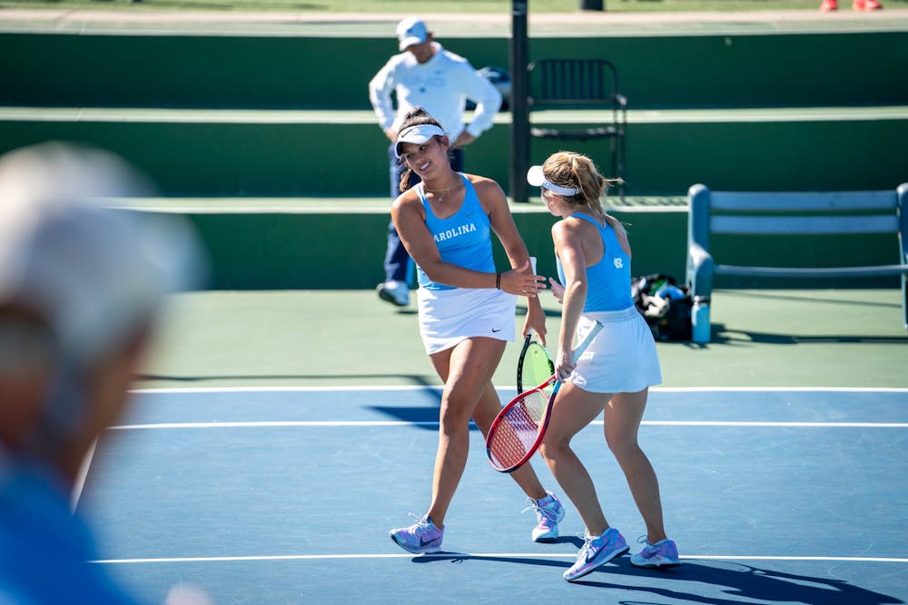 UNC senior Fiona Crawley and sophomore Carson Tanguilig play doubles at the ITA Fall National Championship. Photo Courtesy of ITA. 