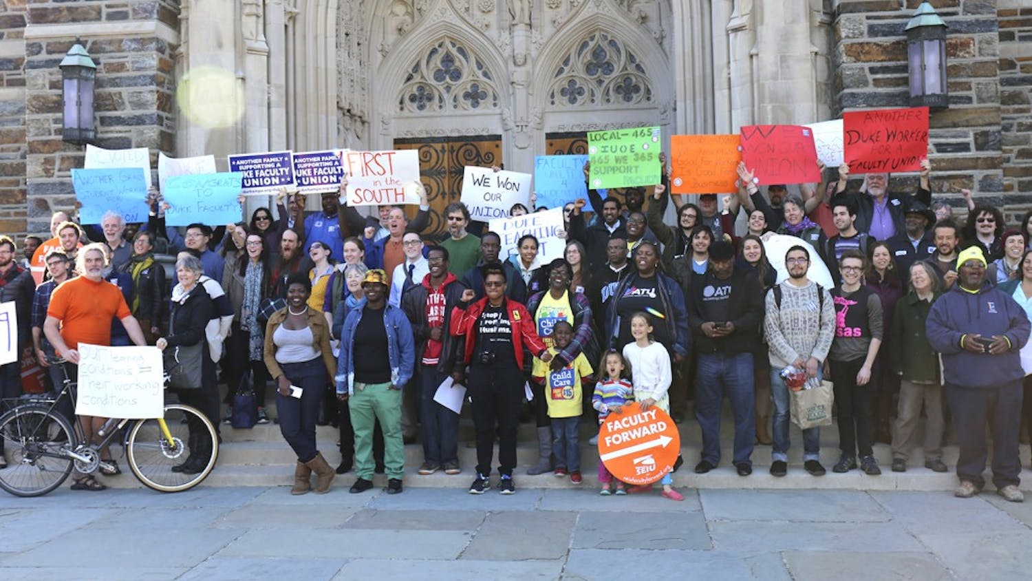 People gather at Duke Chapel to celebrate Duke Teaching First becoming eligible to unionize.