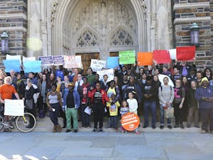 People gather at Duke Chapel to celebrate Duke Teaching First becoming eligible to unionize.