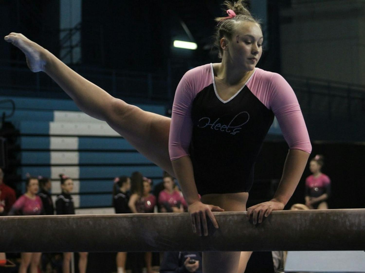 Senior Kaitlynn Hedelund competes against Brown during a North Carolina gymnastics meet on Feb. 19 in Carmichael Arena.