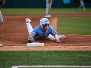 UNC Chapel Hill junior infielder Mac Horvath (10) slides to third during the baseball game versus UNC Charlotte on Tuesday, April 18, 2023. UNC Chapel Hill beat UNC Charlotte 5-3.