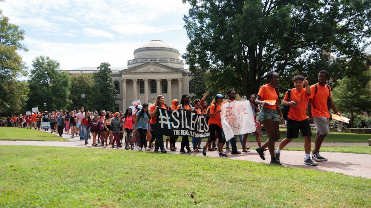 After rallying against the shut down of the UNC Center for Civil Rights, protesters march to Silent Sam to show solidarity with the sit-in.