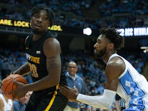 Senior forward Leaky Black (1) guards an Appalachian State player at the game on Dec 21, 2021 at the Dean E. Smith Center. UNC won 70-50.