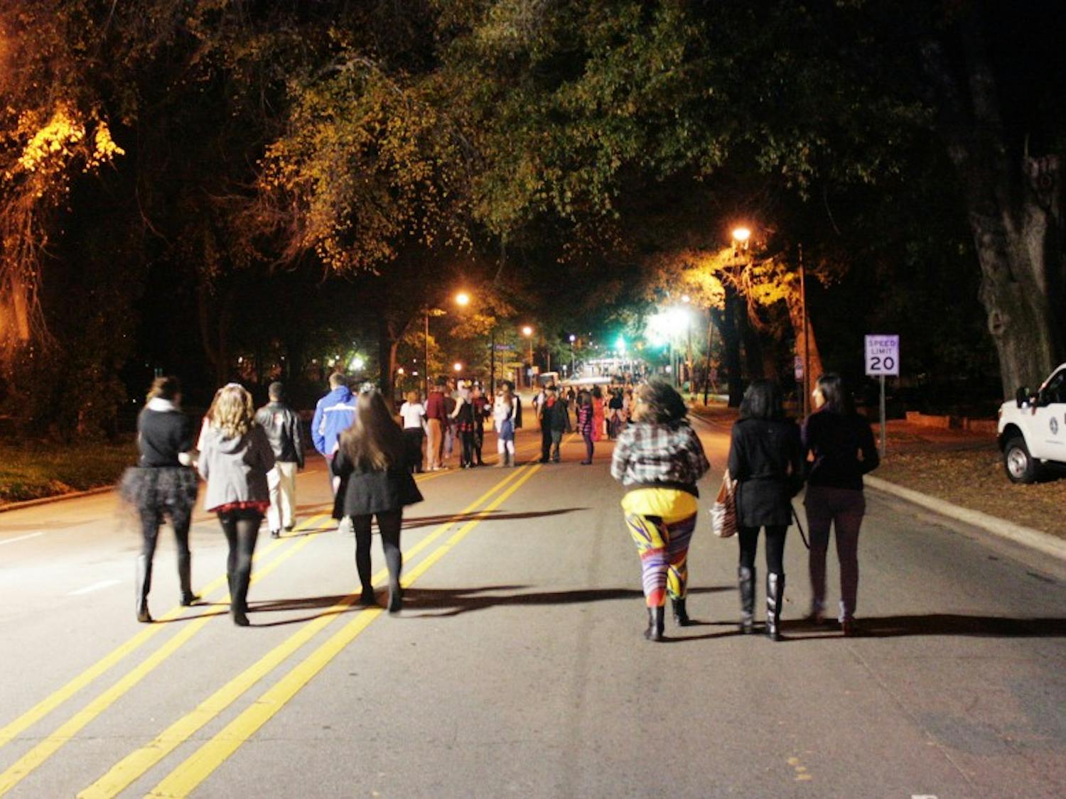 	Students walk along Franklin Street towards the large crowd.