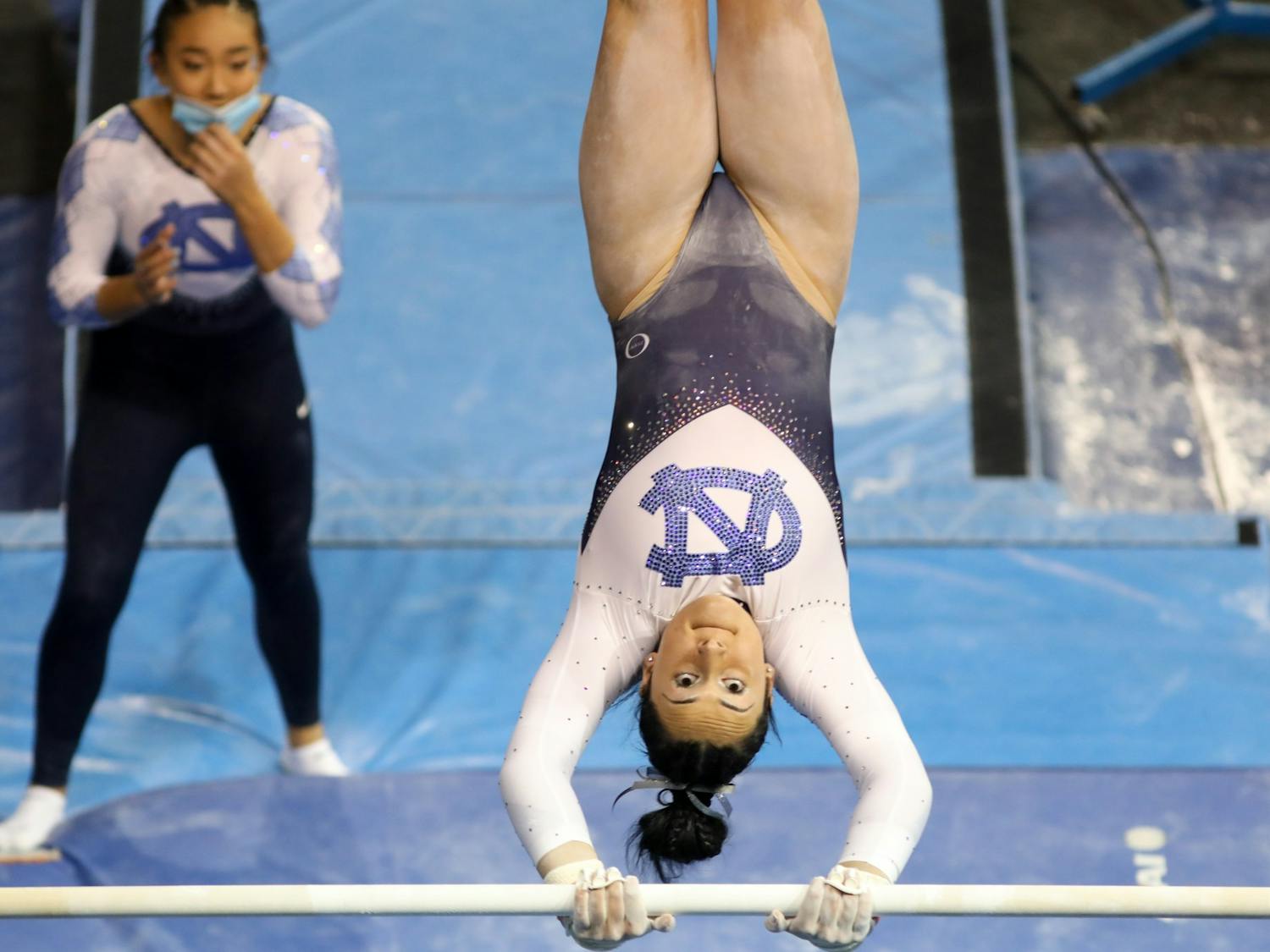 UNC first-year Lali Dekandoize competes on bars at UNC gymanstic's home opener at Carmichael Arena on Friday, Jan. 7, 2022.